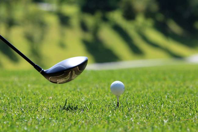 A golf stick and ball.