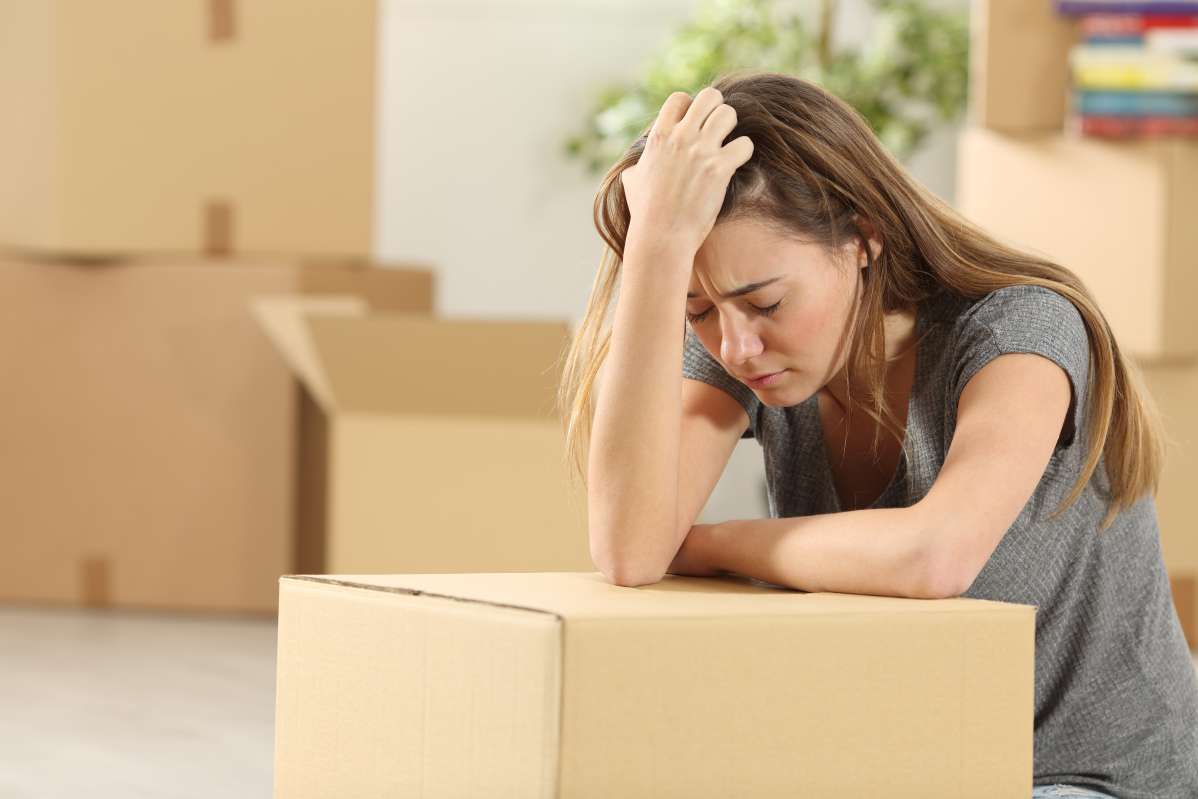 A woman regrets not hiring Seattle movers