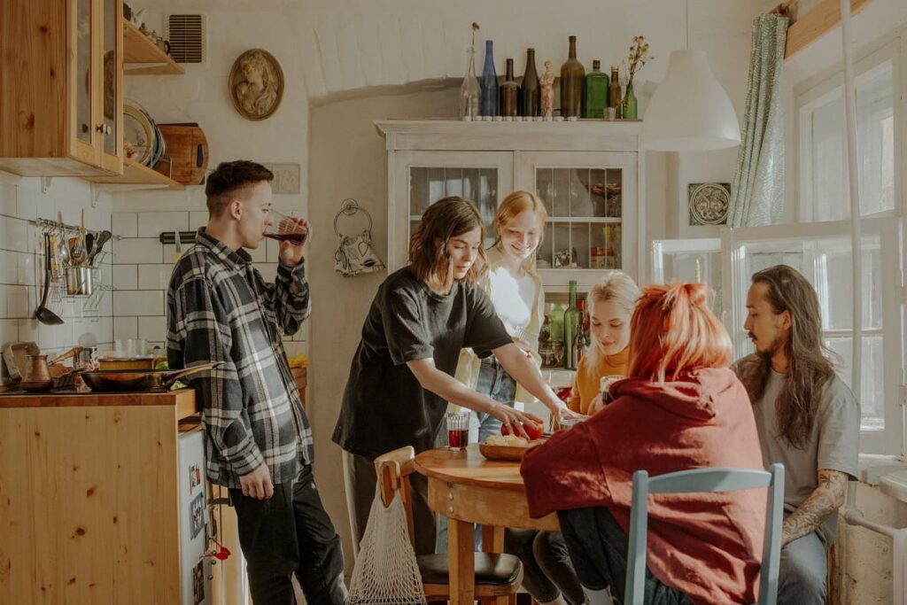 person serving roommates on table